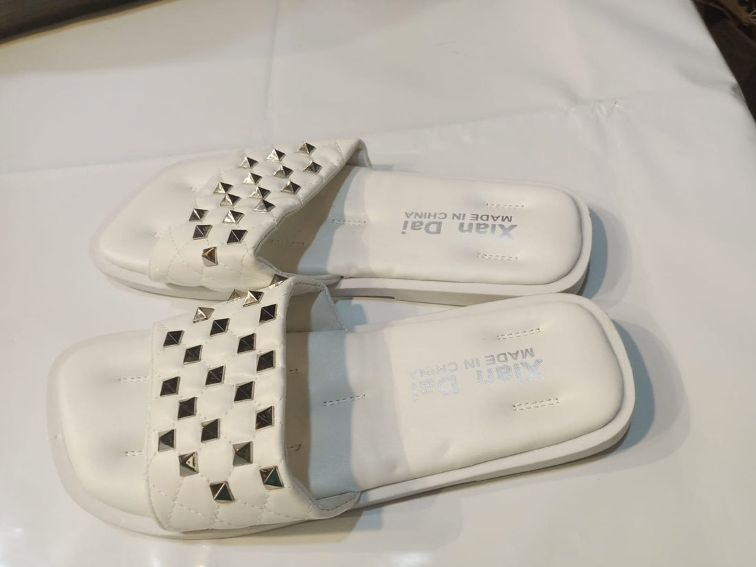 Stylish White Slip-On Sandals with Metallic Studded Design