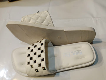 Stylish White Slip-On Sandals with Metallic Studded Design